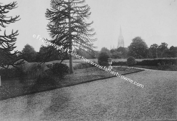 VIEW OF PARK WITH CHURCH SPIRE